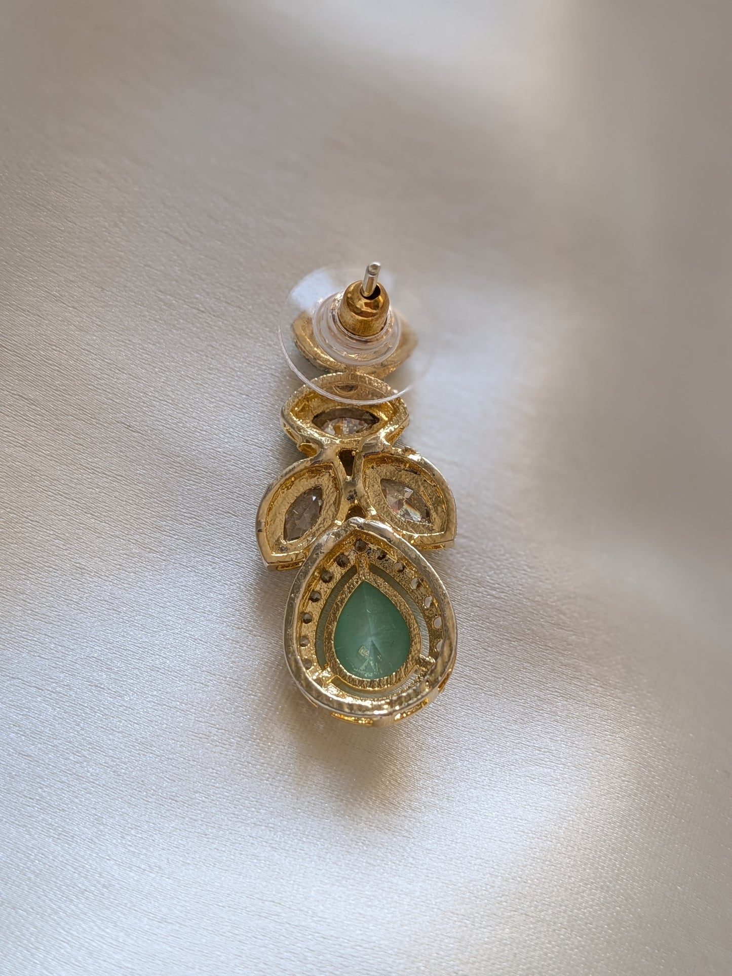 Golden earrings with Kundan and AD in mint green
