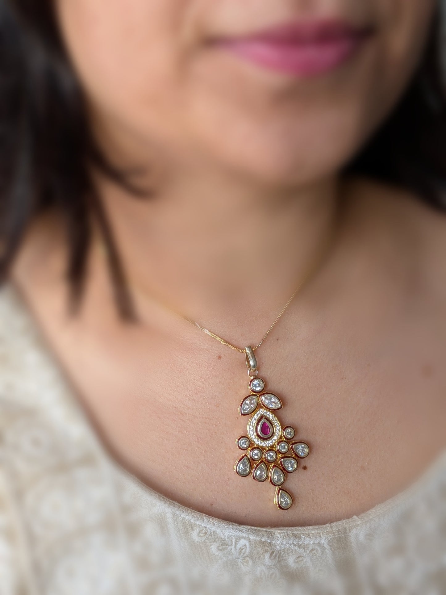 Golden Pendant Set with Kundan and AD in Ruby Red