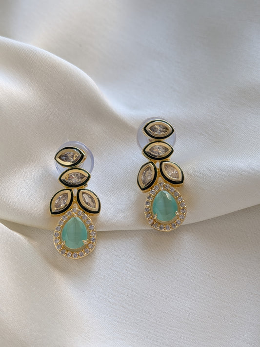 Golden earrings with Kundan and AD in mint green